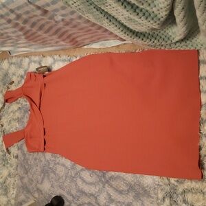 Eva Mendez L dress appropriately 46.5in from shoulder down. Light Orange.
